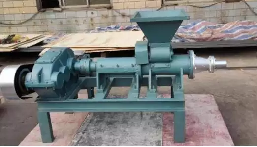 Charcoal briquette machine