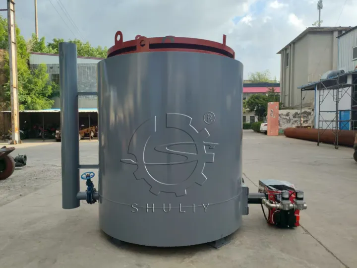 Shuliy hoist carbonization furnace with loading cage and crane